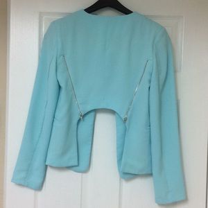 Light blue jacket/blazer with cut out high back
