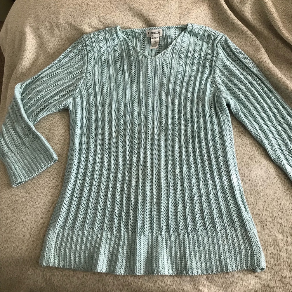 Green sweater.Tribeca Studio