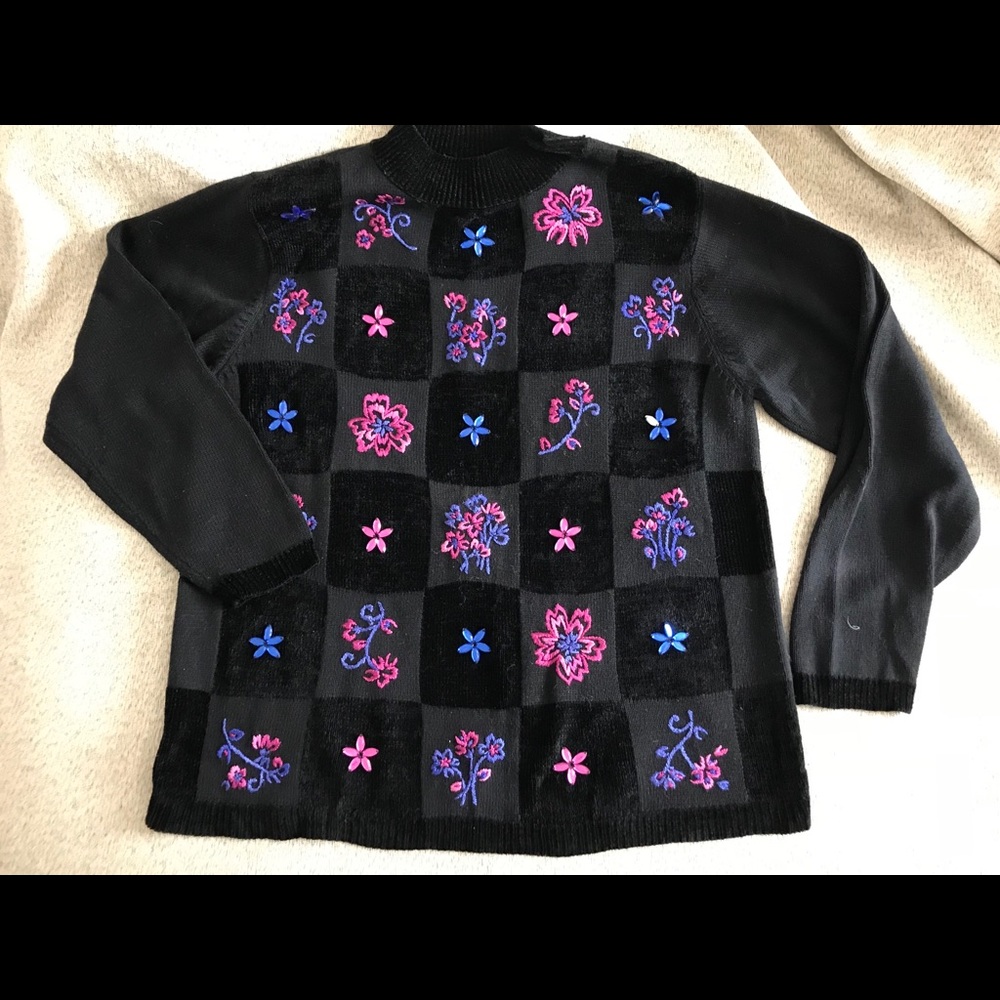 Black sweater . With bright accents.