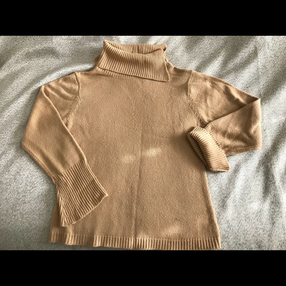 Wonderful cowl neck and flared sleeves.