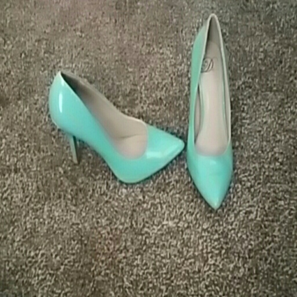 Women teal heels