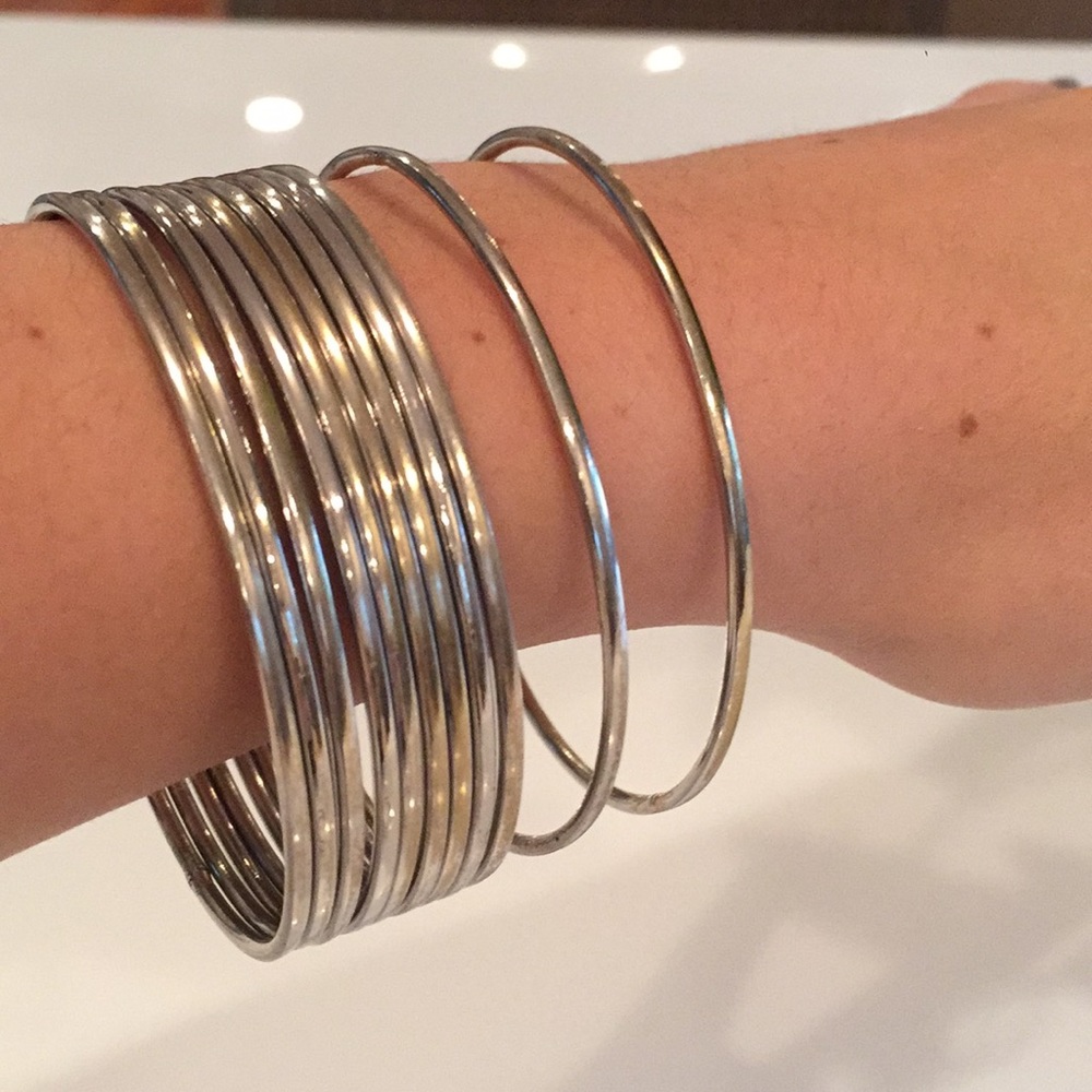 Stack of 11 Solid Silver Bangles