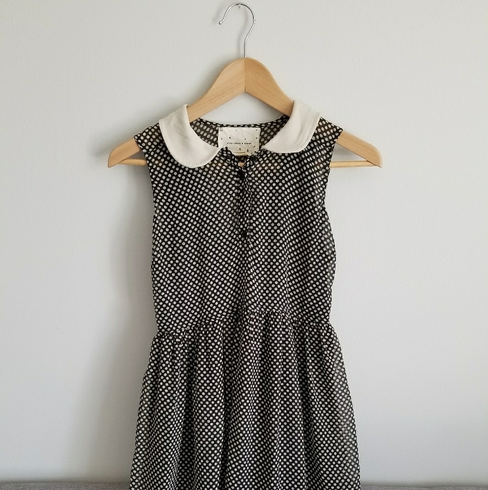 Black and white polka dot open back dress
