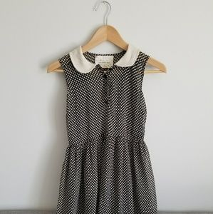 Black and white polka dot open back dress