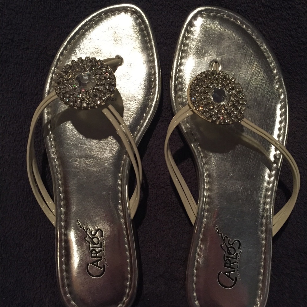 Carlos Santana flip flops