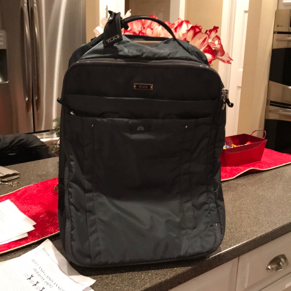 Authentic  Unisex Tumi travel rolling luggage