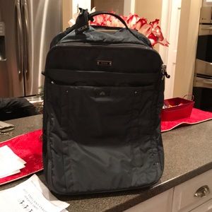 Authentic  Unisex Tumi travel rolling luggage