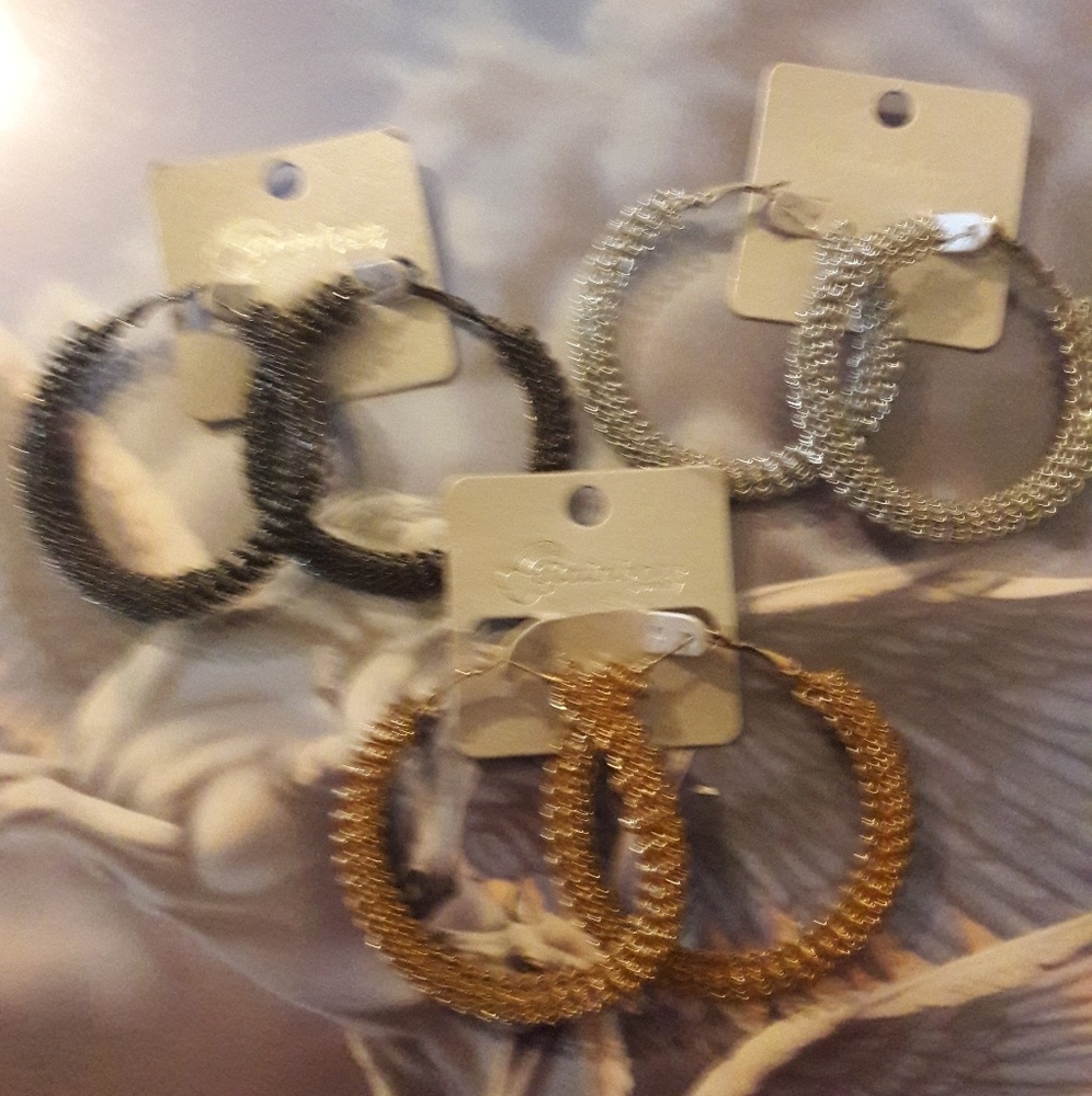 Coil hoop pierced earrings