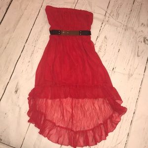 Red strapless high low dress with black belt