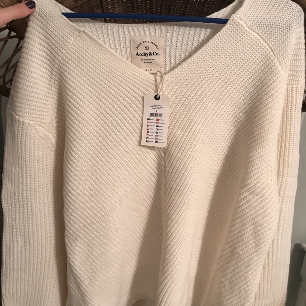 cream sweater