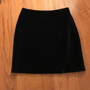 Black velvet skirt.