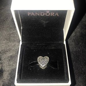Pandora charm that is new with box.