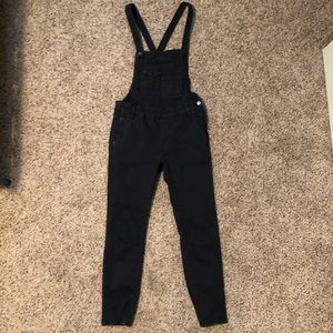 Free People black overalls.