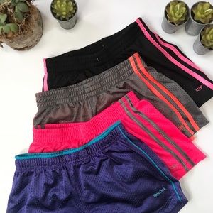 Track shorts! 3 Champion and 1 Reebok.