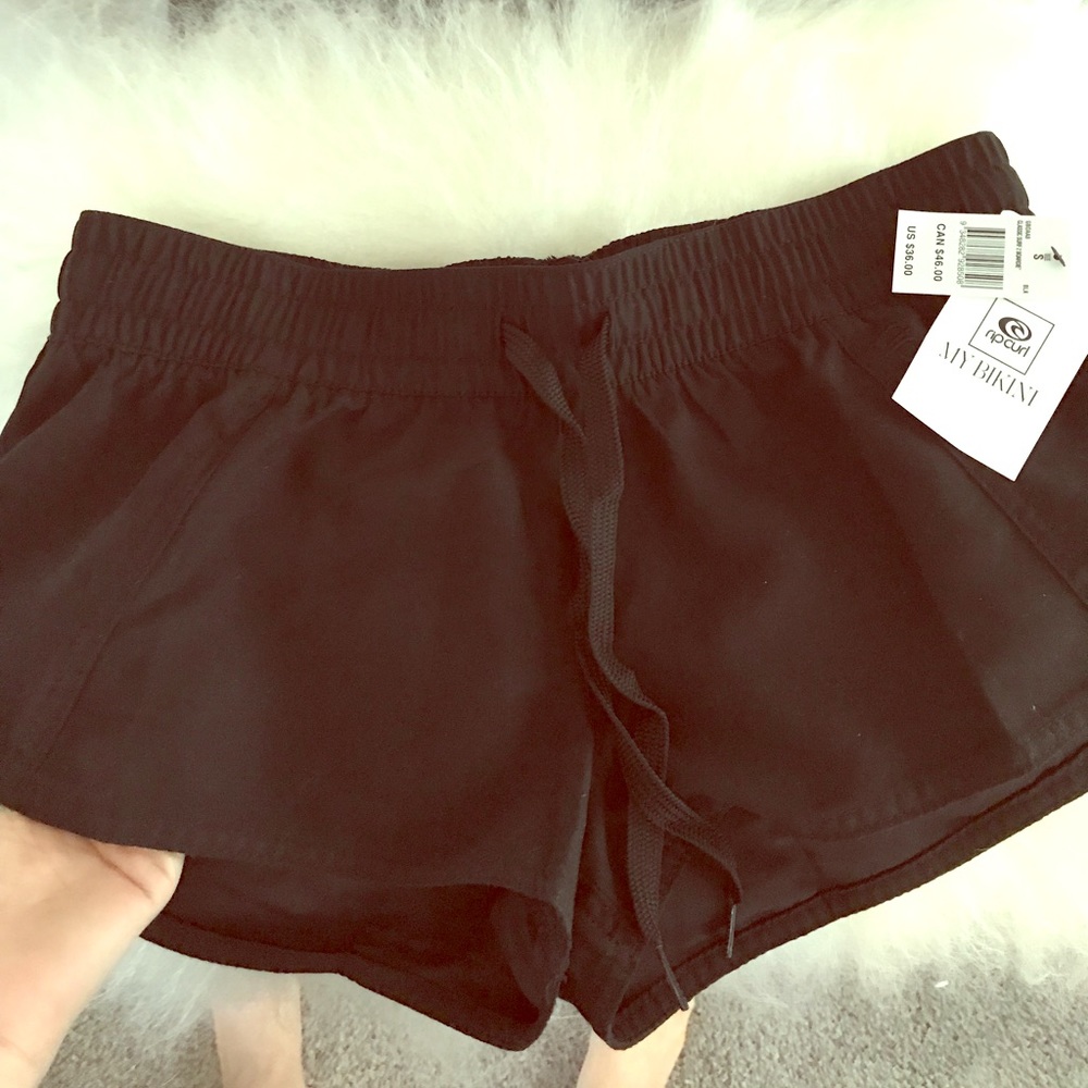 Rip curl woman’s board shorts “NWT”