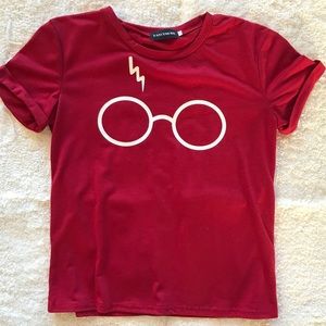 Red Harry Potter glasses and scar shirt
