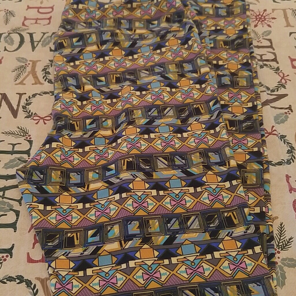 NWT. LuLaRoe TC leggings. Wacky yellow pink blue.