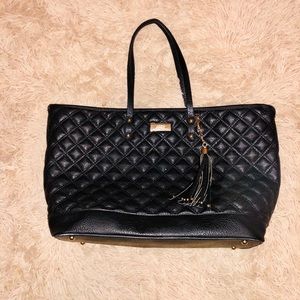 Selling this beautiful BCBG tote