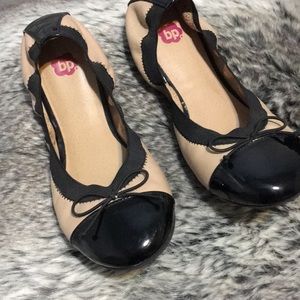 BP NUDE AND BLACK FLATS