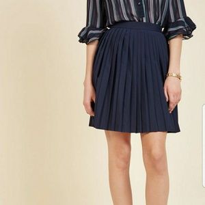 Pleats as Punch Skirt