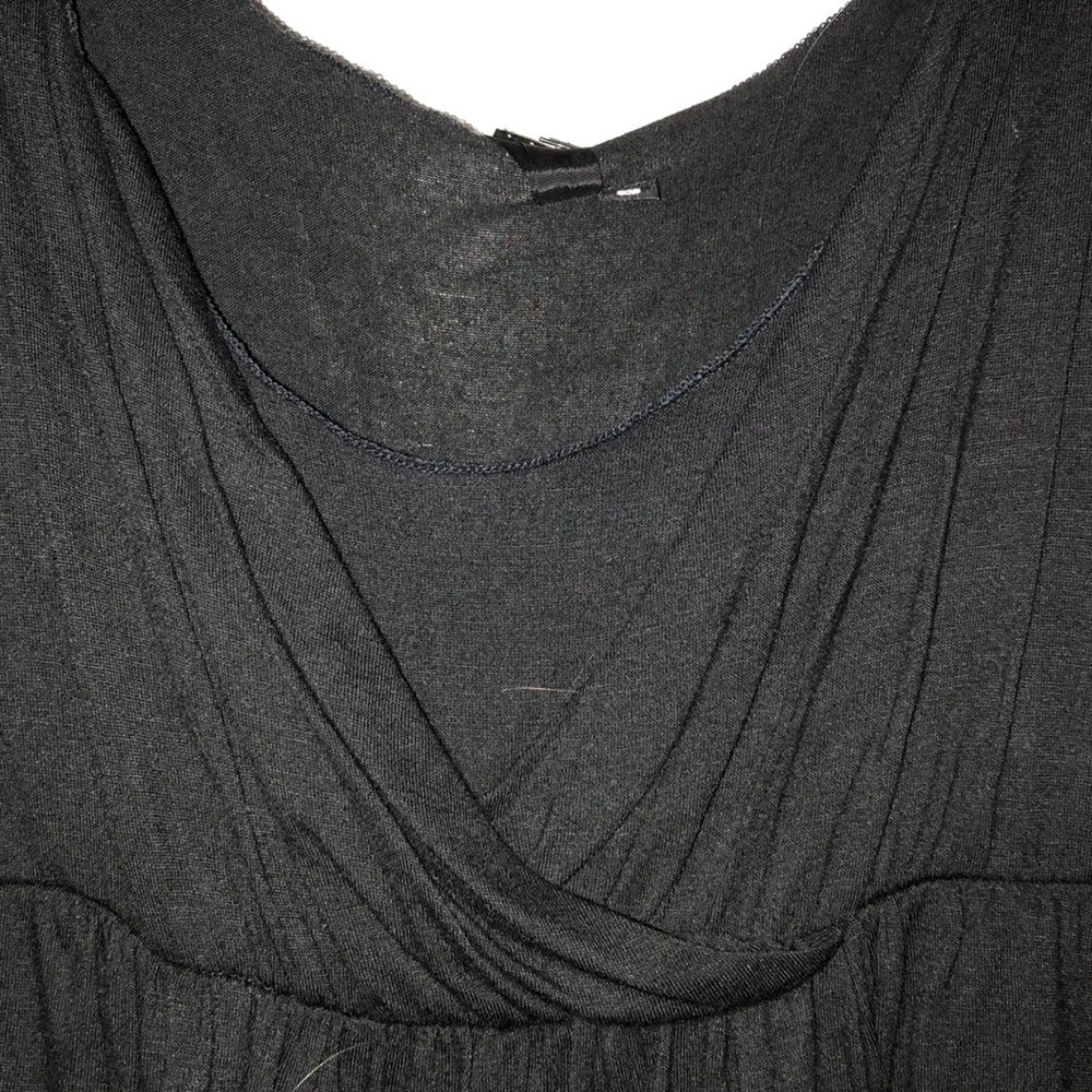 Babydoll black shirt the shirt.  NEW WITH TAGS