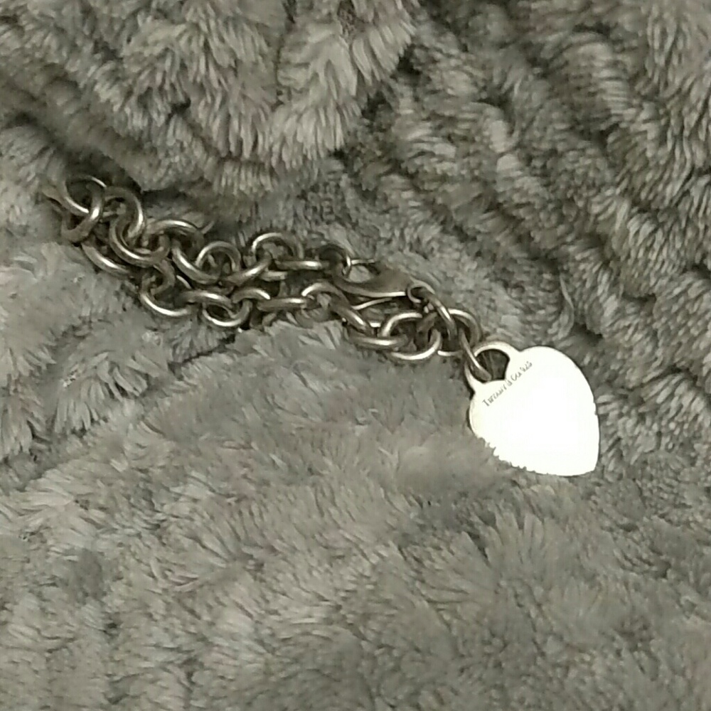 Tiffany co heart charm bracelet