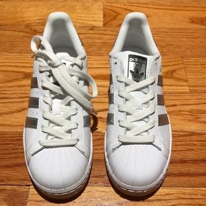 Silver adidas superstars