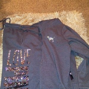 Love pink jogging suit gently used with no rips