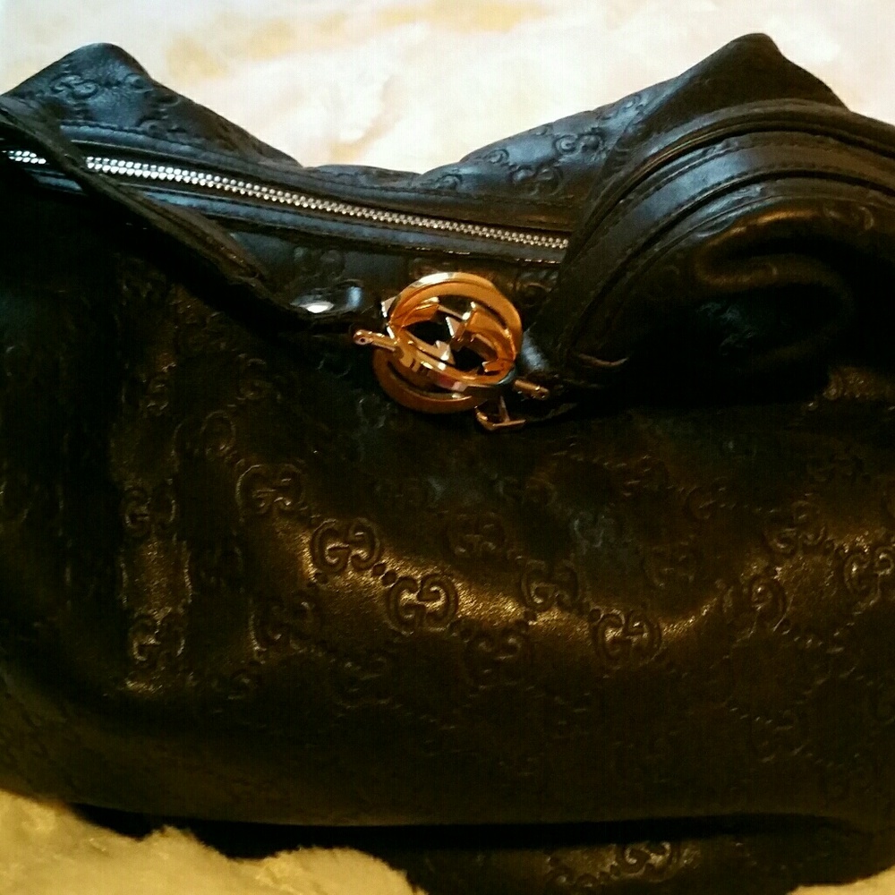 Authentic black Leather Gucci bag.