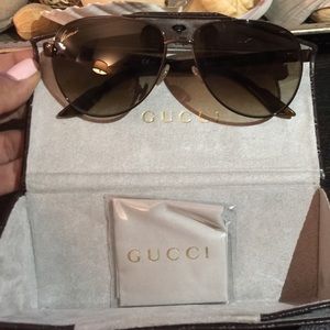 New Gucci Sunglasses. Never worn.