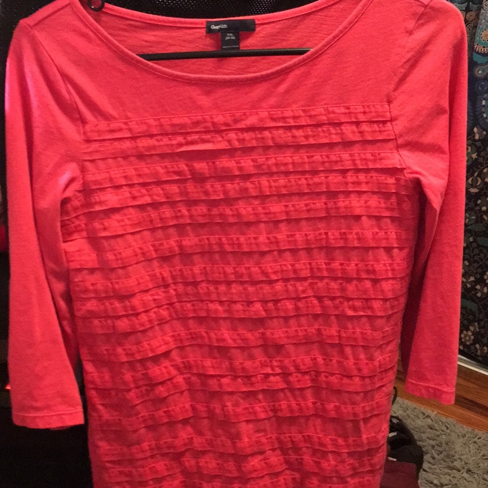 Pink quarter length sleeve shirt