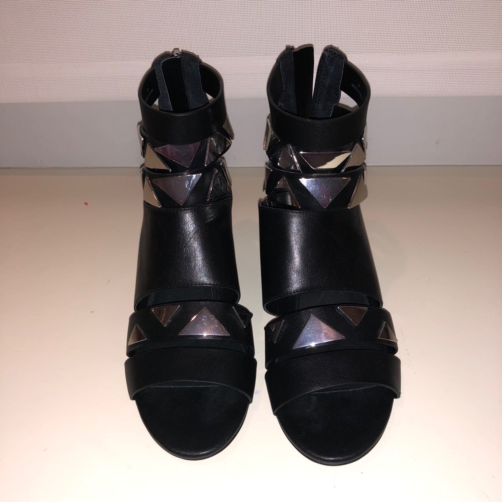 SOLD Heeled cut-out booties with studs