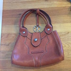 Coccinelle brown bag. 4 inside pockets