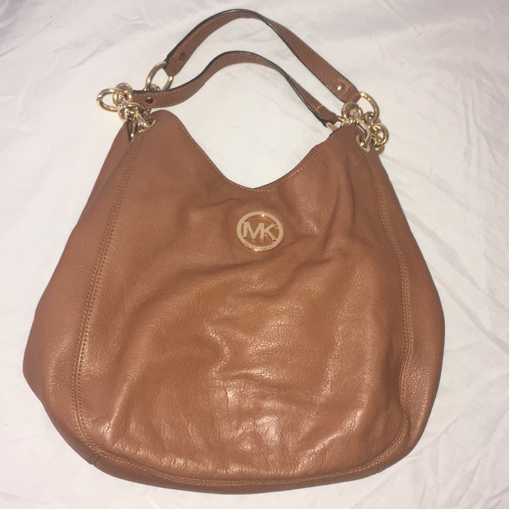 Micheal Kors three pocket Brown Hobo bag