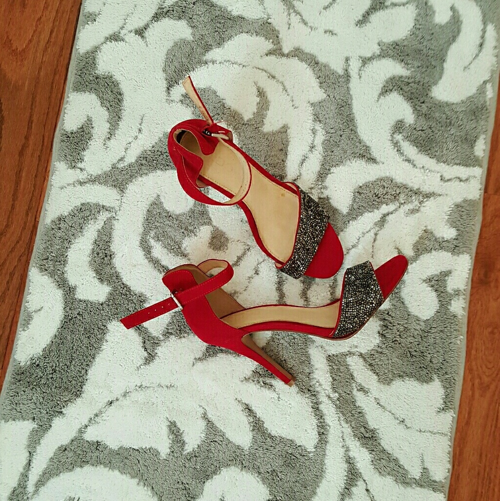 Red ALDO high heel sandals with ankle strap.