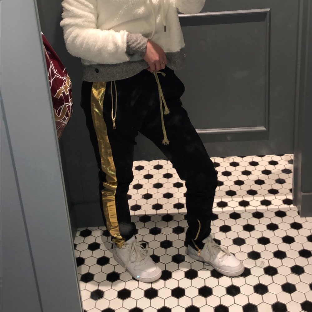 Black and gold sweat pants