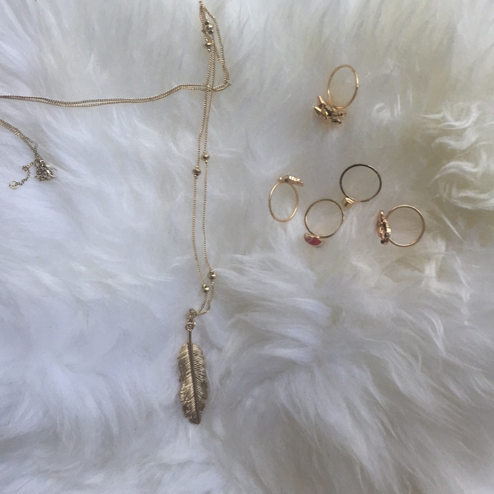 Golden feather necklace and Christmas rings bundle