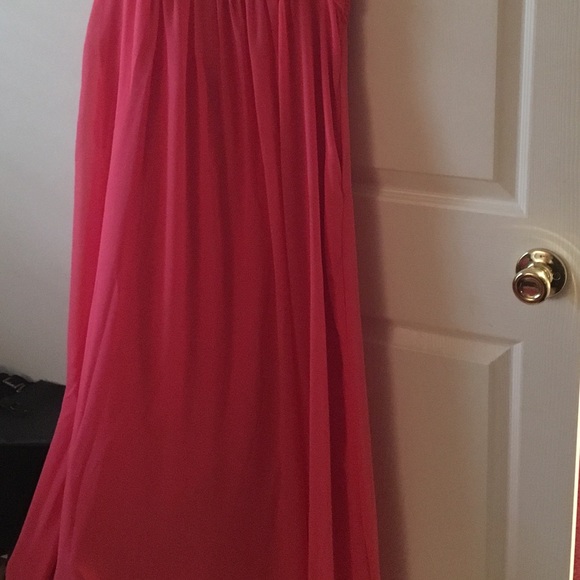 Peach colored formal gown with unique bust design. - Picture 2 of 3