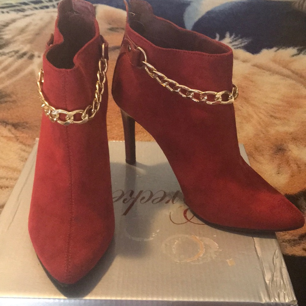 Red booties with gold chain