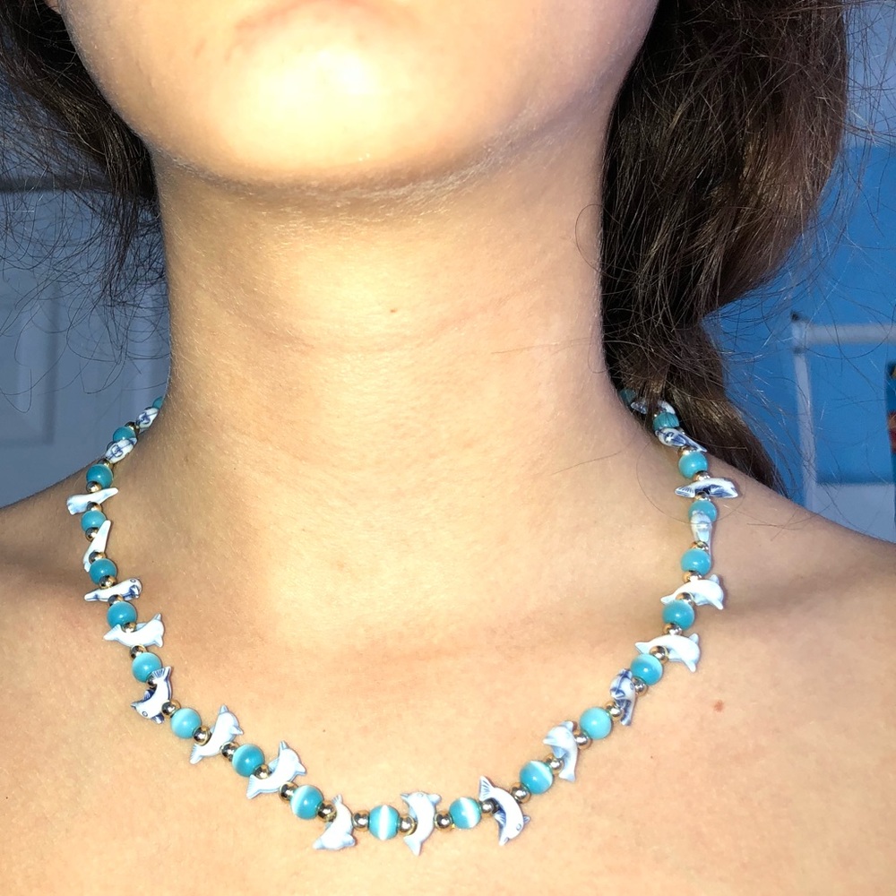 light blue dolphin necklace and bracelet
