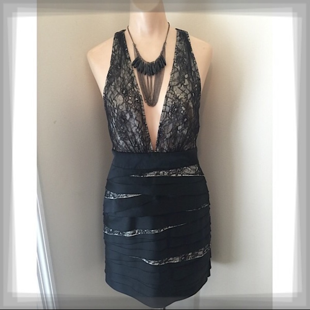 Bebe black lace plunge bandage dress.