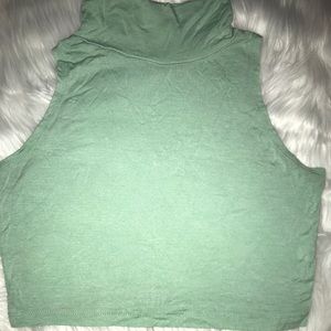Sleeveless cropped turtleneck