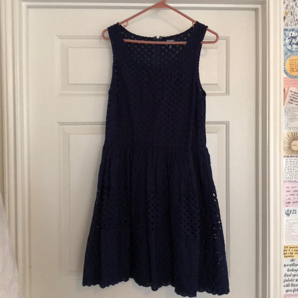 Navy blue sleeveless dress.