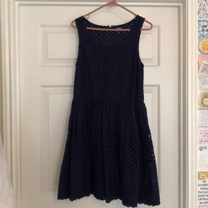 Navy blue sleeveless dress.
