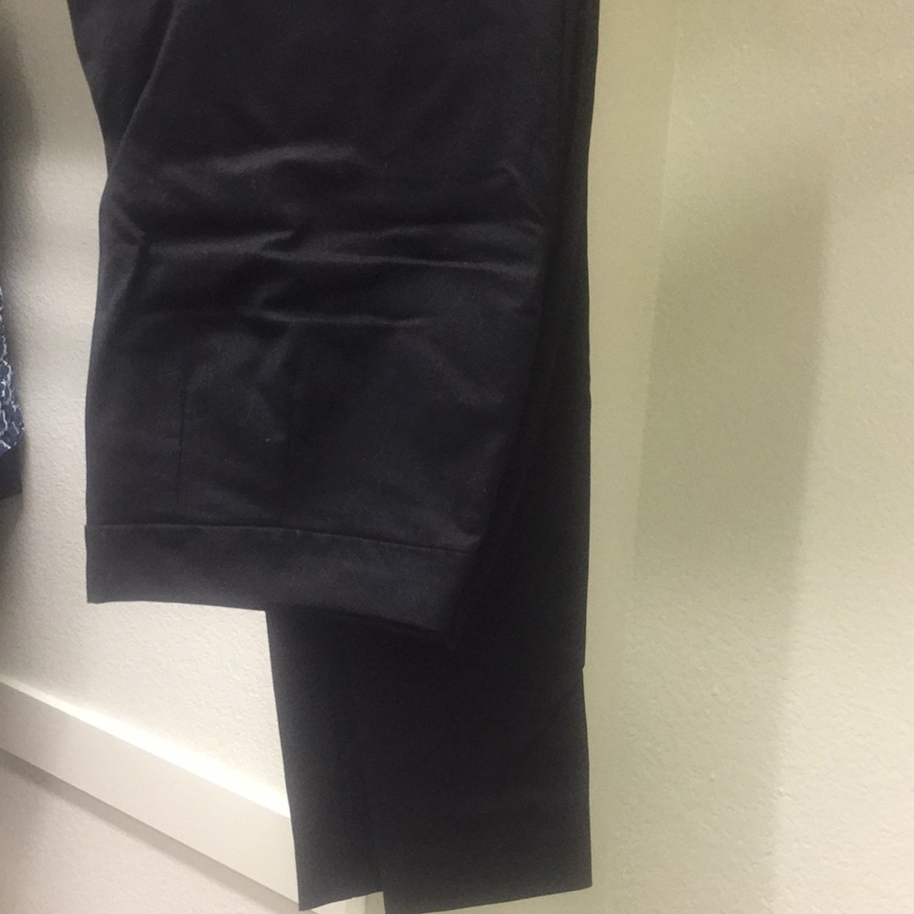 Black skinny trousers.
