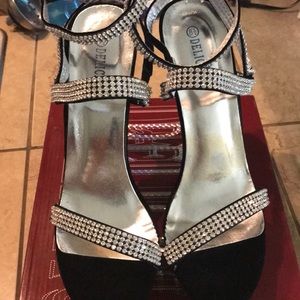 Black suede ankle strap shoes