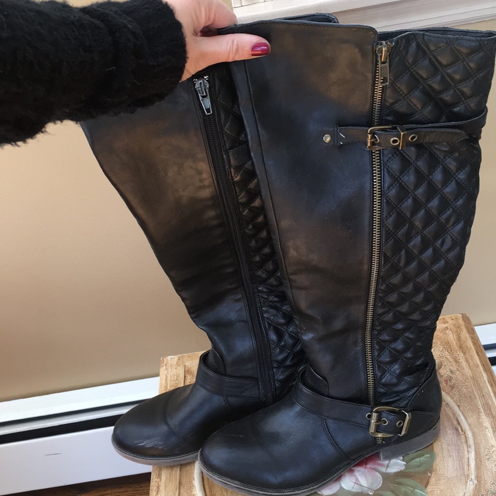 Tall black leather boots