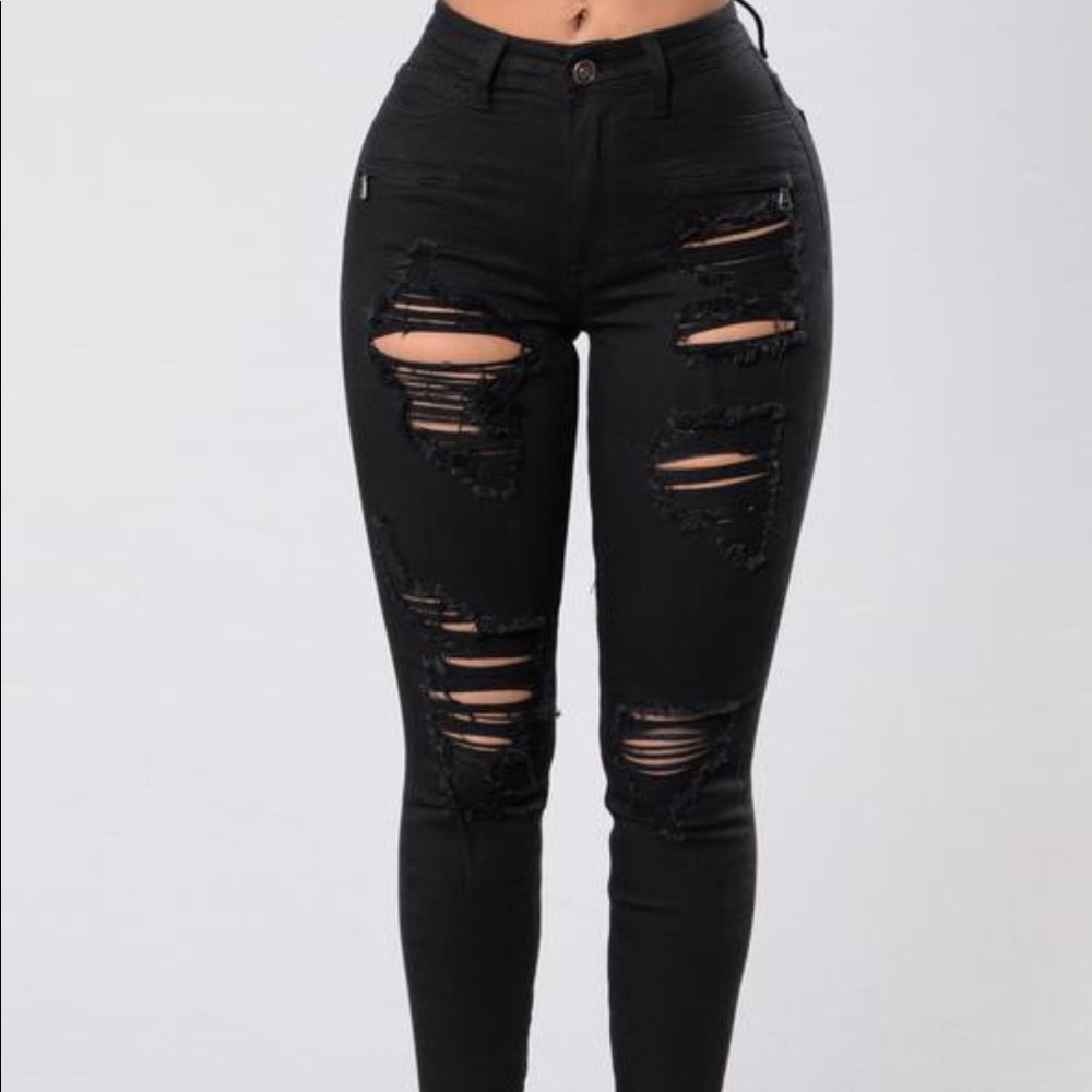 Black distressed skinny leg jeans