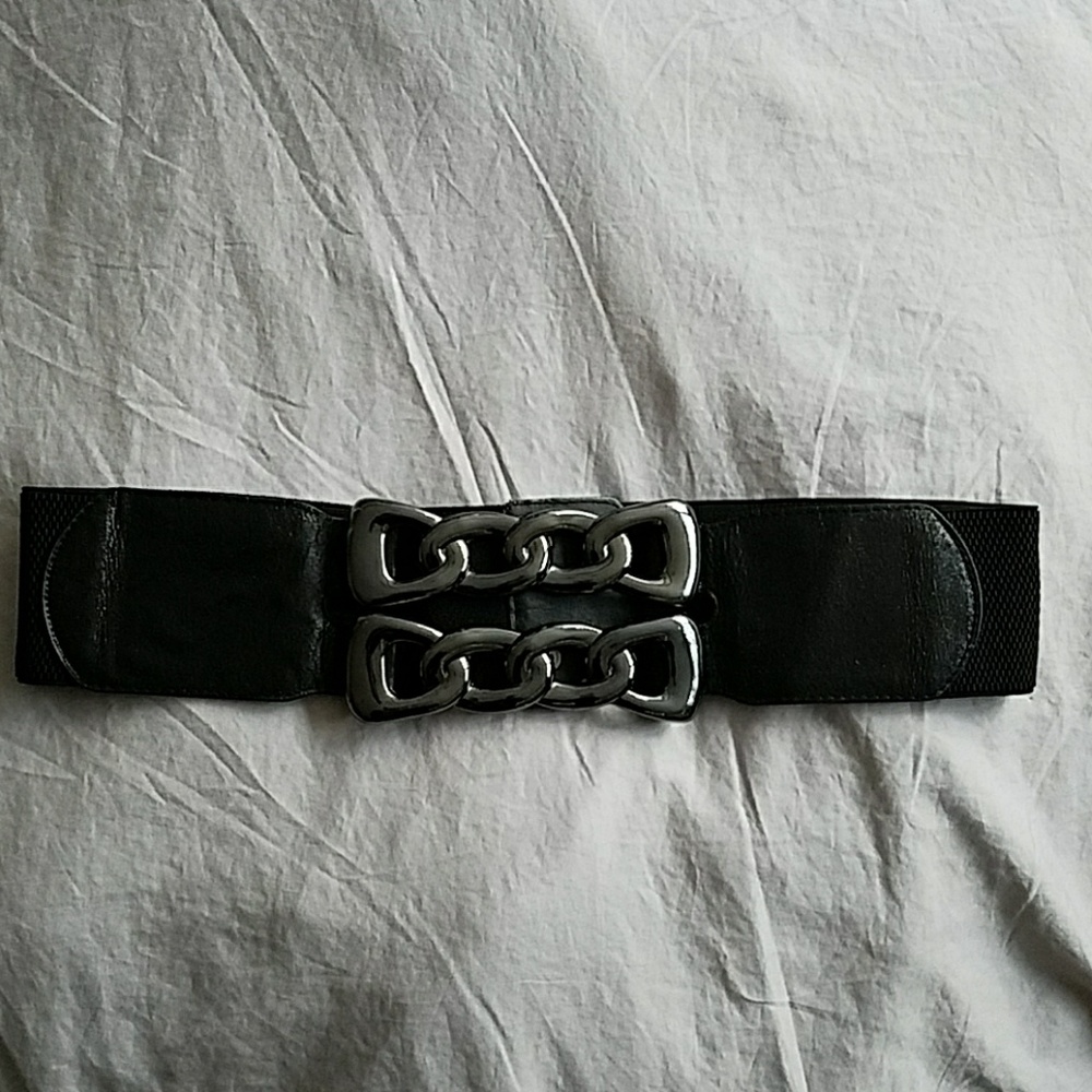 Black and silver buckle waist belt