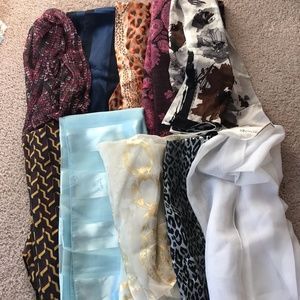 23 Scarves in various colors and styles